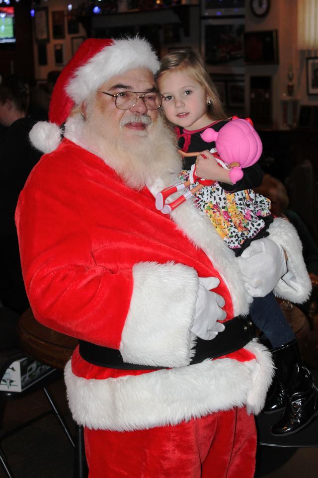 Children's Christmas Party at 8-100.   12-9-2012.  Santa pays a visit . Photo by Vincent P. Tuzzolino